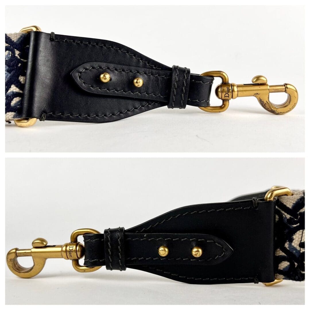 Black leather strap with gold clasps.