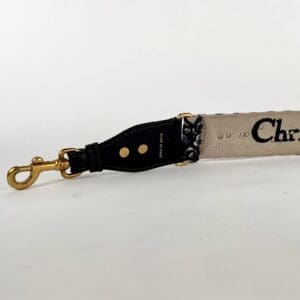 Designer bag strap with metal clip.