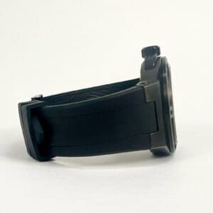 Black wristwatch with a rubber strap.