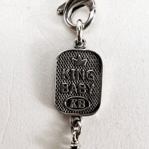 Silver King Baby KB dog tag pendant.