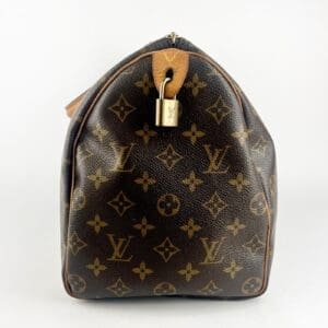 Luxury designer handbag with monogram pattern.