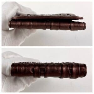 Brown leather notebook with rounded spine.
