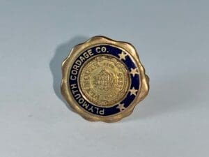 Plymouth Cordage Co. gold and blue pin.