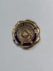 Plymouth Cordage Co. gold and blue badge.
