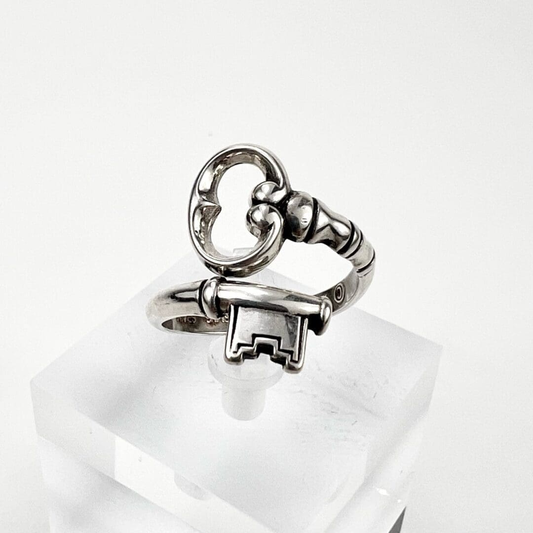 Silver ring shaped like a vintage key.