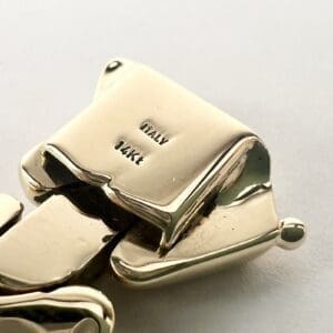 Gold clasp with "Italy 14K" engraving.