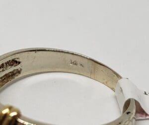 Close-up of a 14K gold ring.