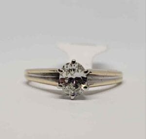 Gold ring with a diamond centerpiece.