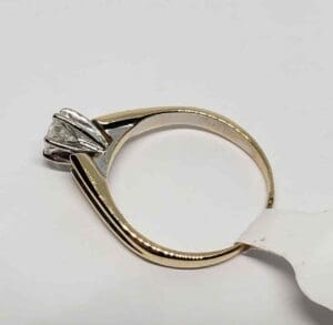Gold and silver ring with diamond.
