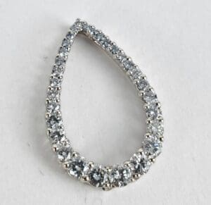 Teardrop-shaped diamond necklace pendant.