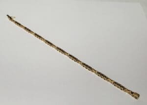 Gold and silver chain on white background.