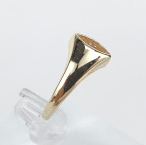 Gold ring with a flat top design.