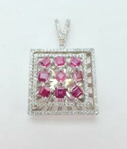Square pendant with pink gemstones and diamonds.