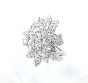 Clustered diamond ring with silver band.