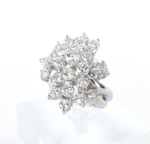 Diamond cluster ring on white background.