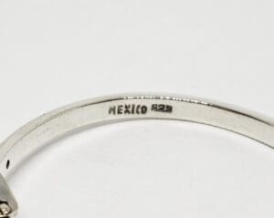 Silver ring stamped with "Mexico 925".