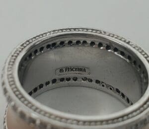 Silver ring with "925 China" engraving inside.