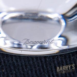 Baccarat glassware with signature, Barry's logo visible.