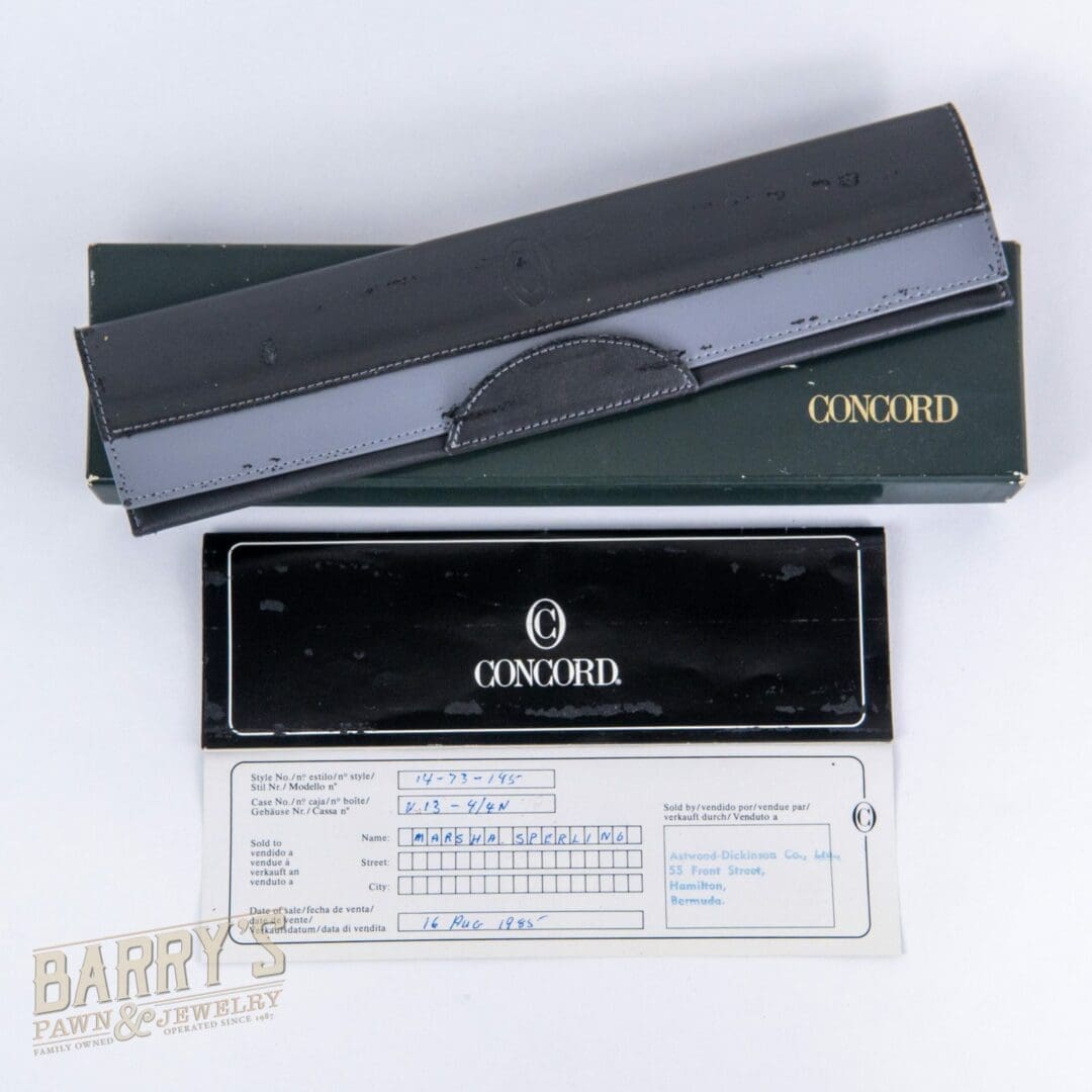 Concord watch box and warranty card.