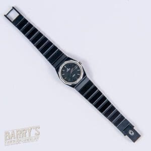 Black wristwatch with metal bracelet.