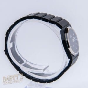 Black watch with a sleek metal frame.