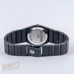 Black wristwatch with visible back and band.