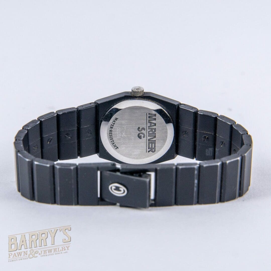 Black wristwatch with visible back and band.