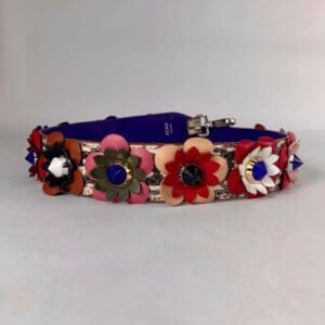 Floral leather dog collar with colorful flowers.
