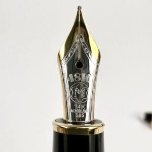 Gold and silver fountain pen nib.
