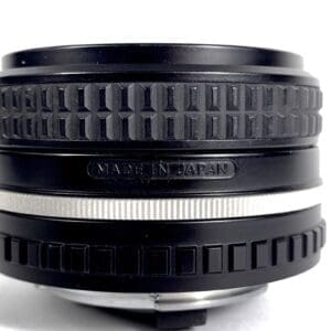 Camera lens with "Made in Japan" marking.