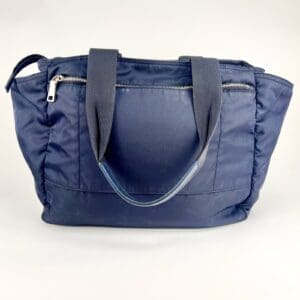 Navy blue tote bag with zipper closure.
