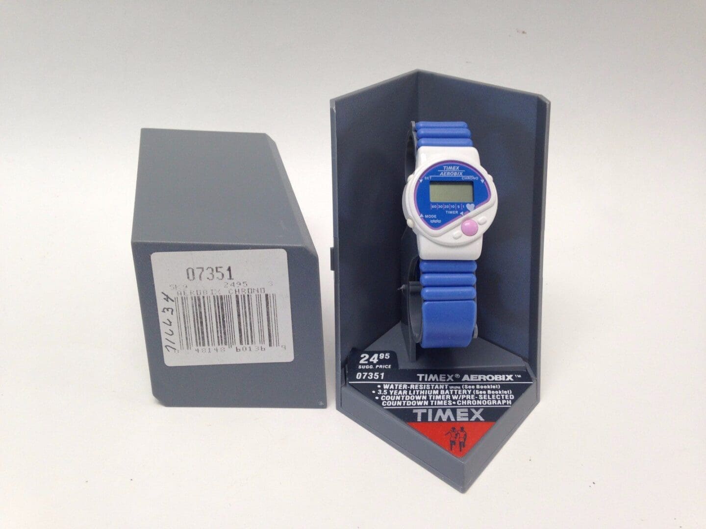 Blue digital Timex watch in packaging.