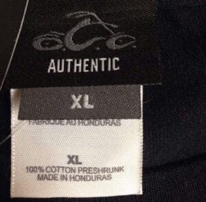 Black and white clothing label, size XL.