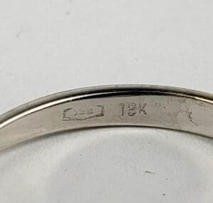 18K gold ring with hallmark stamp.