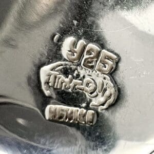 Silver hallmark stamp with "925" and "Mexico".