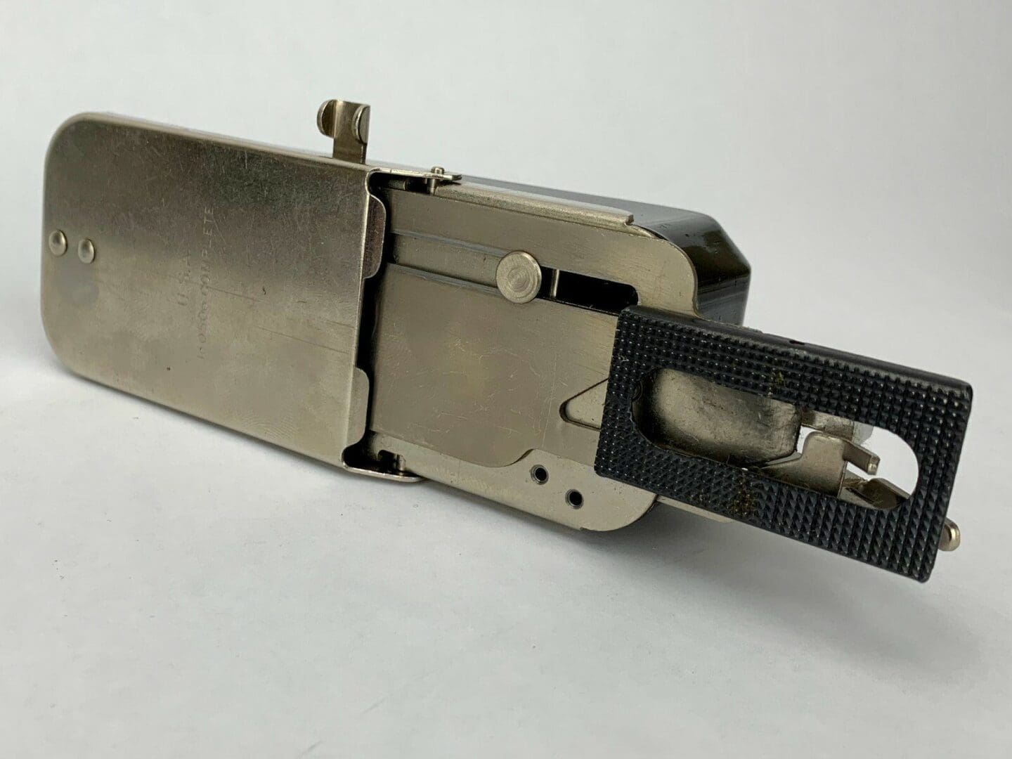 Vintage camera with metal and black components.