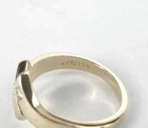 Gold ring with 10K engraving inside band.