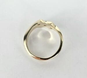 Gold ring with unique design.