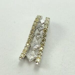 Diamond and gold gemstone bracelet on display.