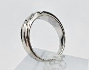 Silver ring with a minimalist design.