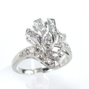 Elegant silver ring with sparkling diamond design.