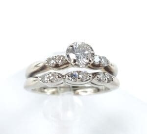 Two diamond rings with intricate designs.