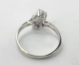 Silver ring with a raised setting.