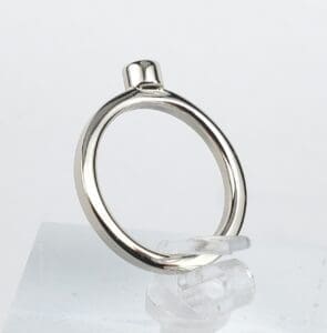 Silver ring with unique design on display.