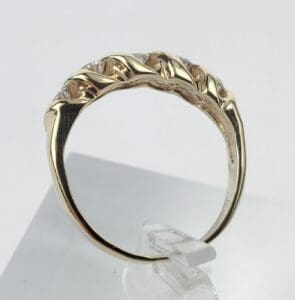 Gold ring with twisted band design.