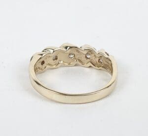 Gold ring with a braided design.