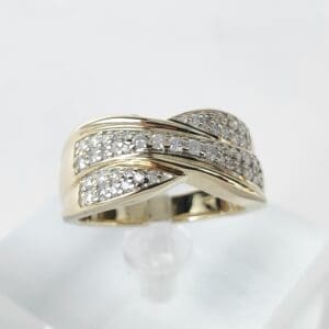 Gold ring with diamond accents.