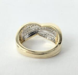 Gold ring with intricate interior design.