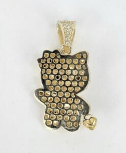 Gold cat-shaped pendant with heart detail.