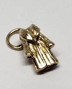 Gold bathrobe charm with loop attachment.